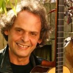 Roland Dyens (1955–2016), renowned French classical guitarist and composer, featured in Sam Desmet's Unity in Diversity — Taiwan chapter