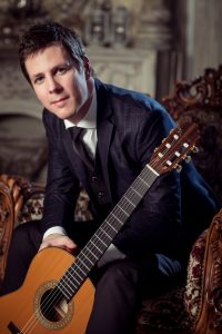 Sam Desmet, classical guitarist, studio portrait